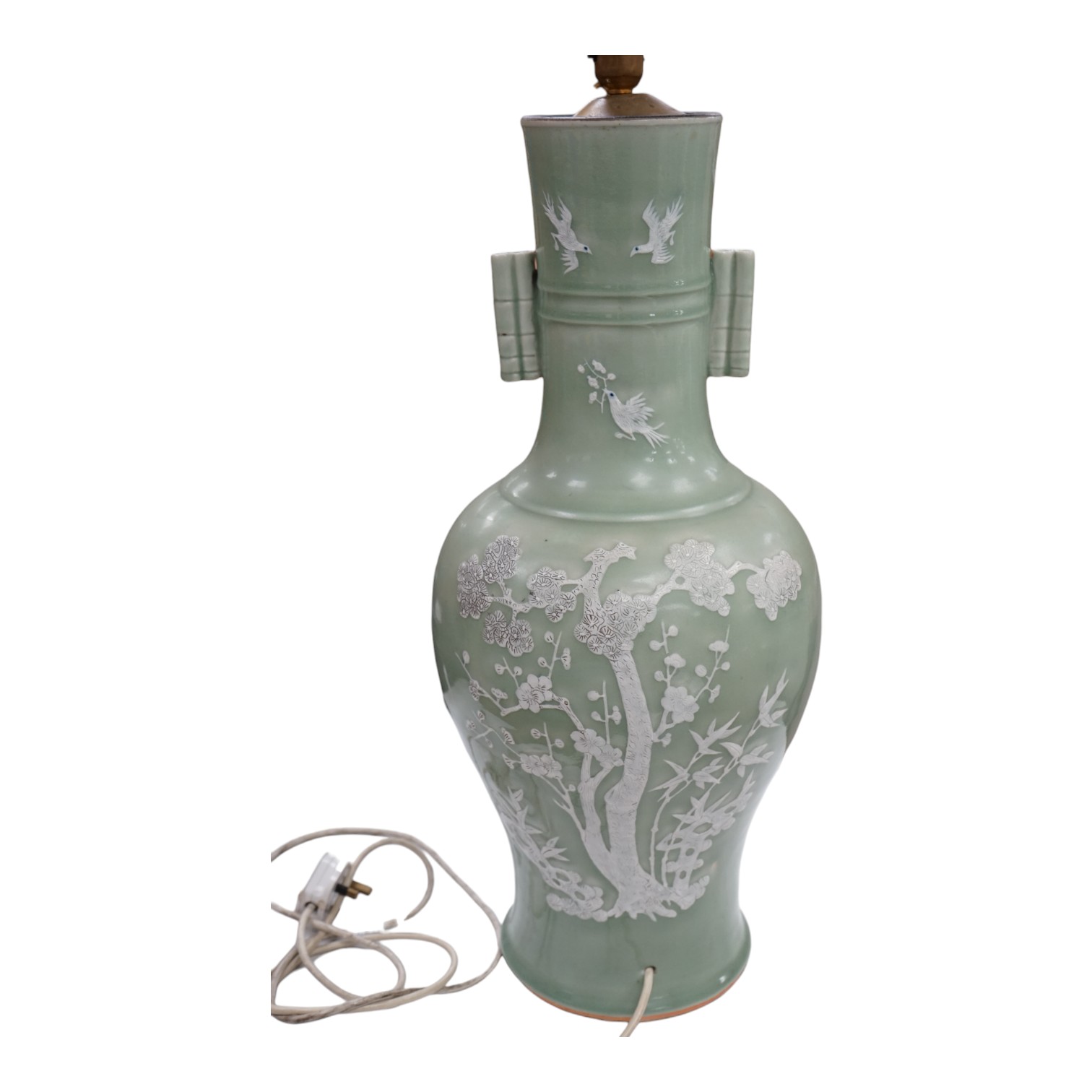 A large Chinese underglaze blue and slip decorated celadon ground vase, converted to a lamp, 61cm high. Condition - a crack 16cm down the side of the body